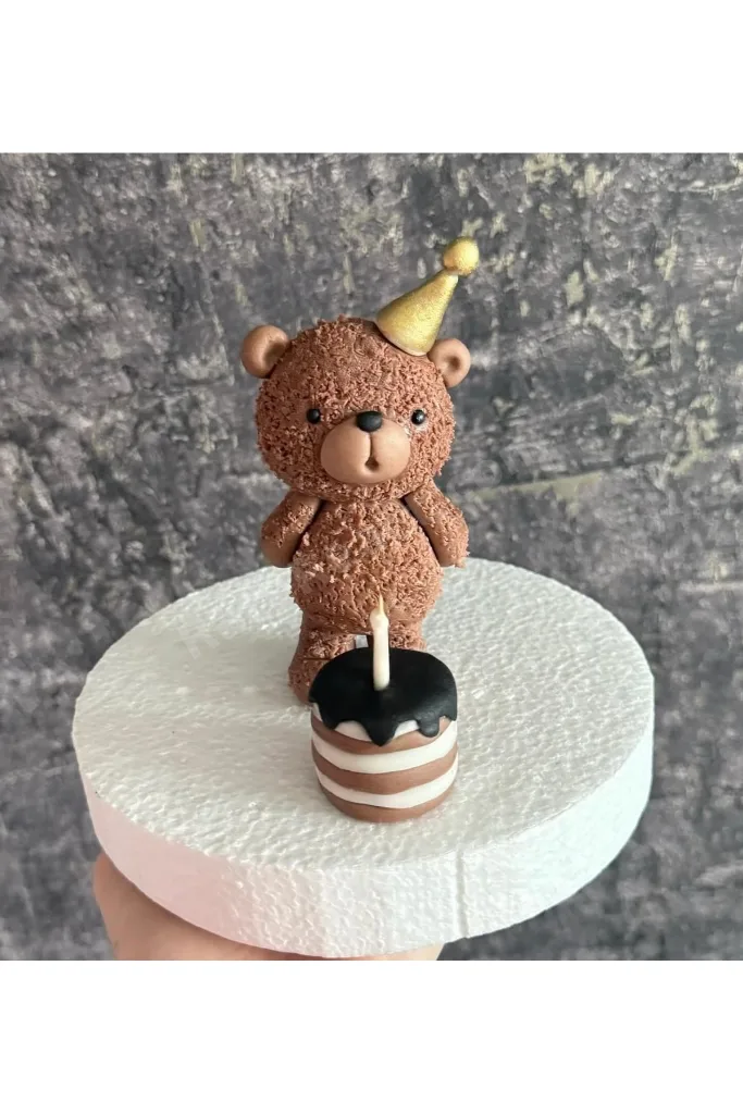 Mum üfleyen ayıcık figür