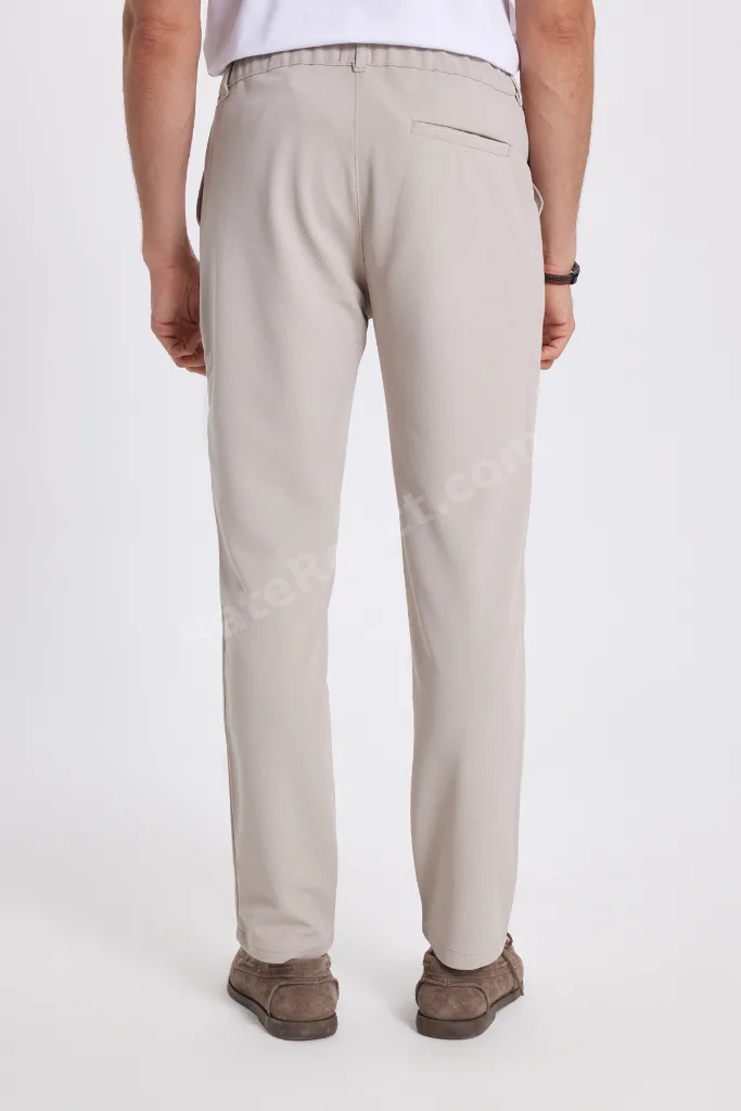 Erkek Slim Fit Dar Kesim Beli Lastikli Bağcık Detaylı Taş Pantolon